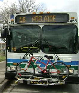 Bike stored on the front of a bus bike rack