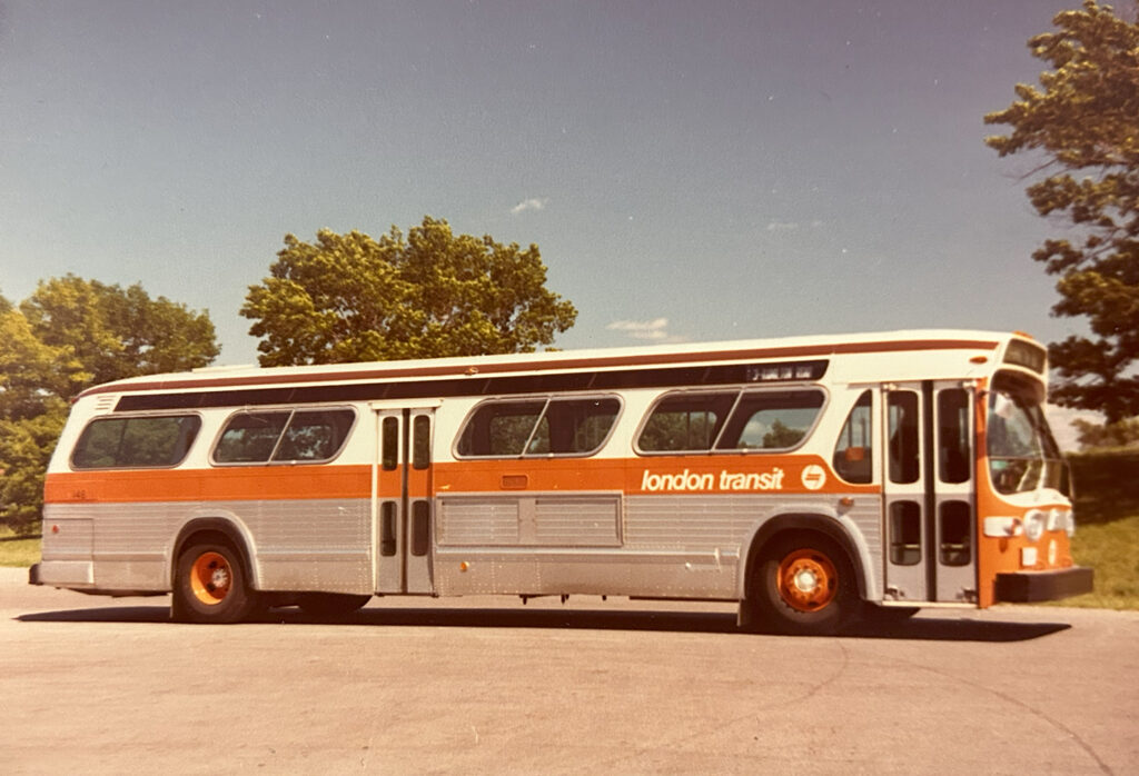 Photo of the orange and brown branded buses of London Transit from 1974 when the rebrand occurred.